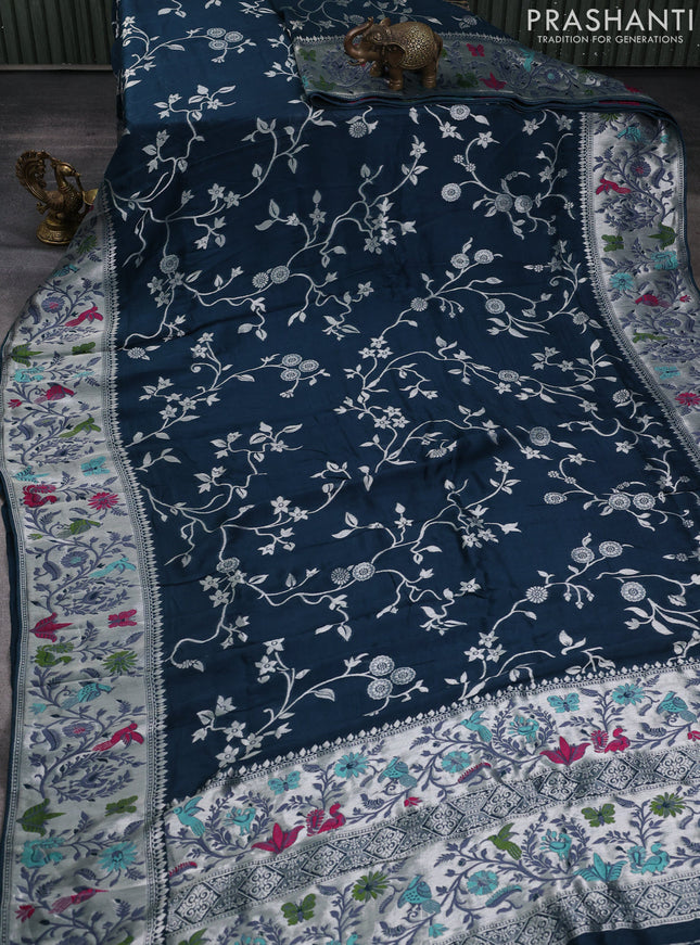 Banarasi raw silk saree dark peacock green with allover floral silver zari weaves and thread & silver zari woven border