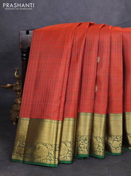 Pure kanchipuram silk saree rust shade and green with allover zari checks & buttas and zari woven border