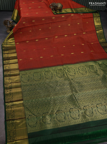 Pure kanchipuram silk saree rust shade and green with allover zari checks & buttas and zari woven border