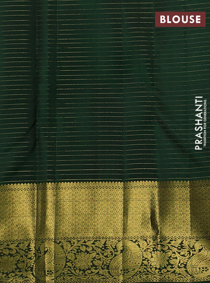 Pure kanchipuram silk saree rust shade and green with allover zari checks & buttas and zari woven border