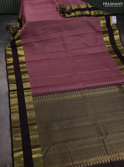 Pure kanchipuram silk saree rosy brown and deep jamun with allover zari woven lakshadeepam pattern and long rettapet zari woven border