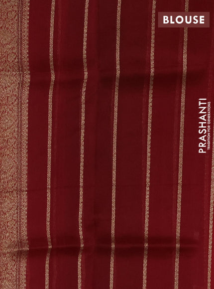 Banarasi organza silk saree green and red with allover thread & zari woven buttas and banarasi style border