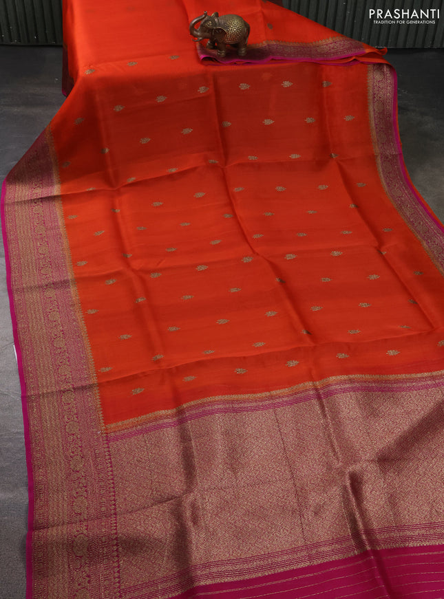 Banarasi organza silk saree orange and pink with allover thread & zari woven buttas and banarasi style border