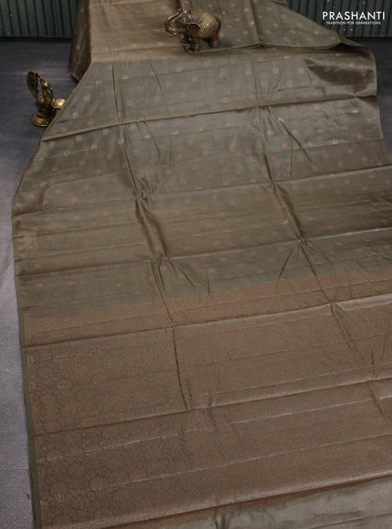 Banarasi tussar silk saree elachi green with allover thread & zari woven buttas in borderless style