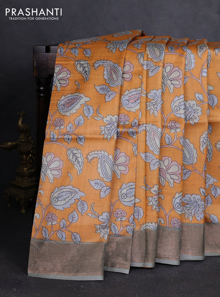 Pure tussar silk saree orange and pastel green with allover kalamkari prints and zari woven border