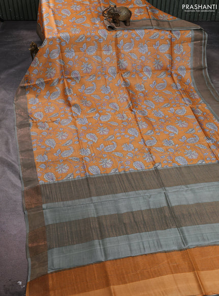 Pure tussar silk saree orange and pastel green with allover kalamkari prints and zari woven border