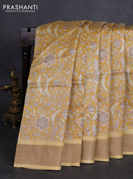 Pure tussar silk saree yellow with allover floral prints and zari woven border