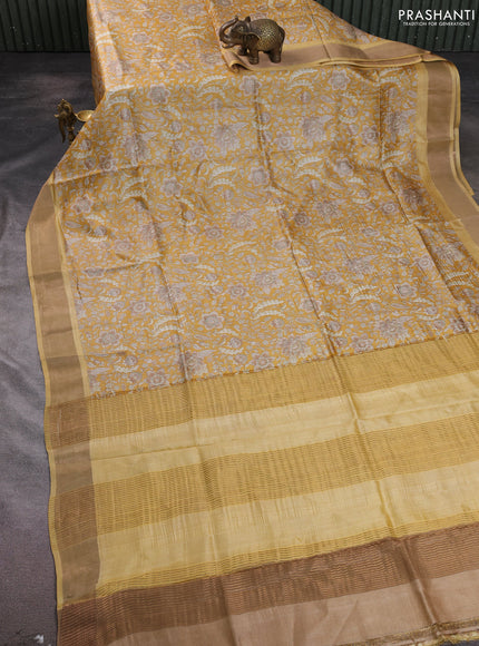 Pure tussar silk saree yellow with allover floral prints and zari woven border