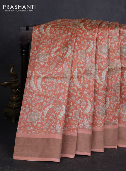 Pure tussar silk saree peach shade with allover floral prints and zari woven border