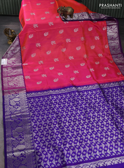 Venkatagiri silk saree dual shade of pinkish orange and dark blue with silver zari woven buttas and silver zari woven annam border
