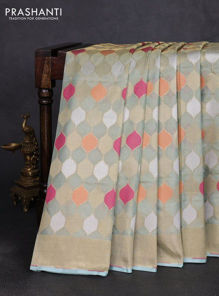 Banarasi tissue uppada silk saree teal blue with allover thread & zari geometric weaves and zari woven border