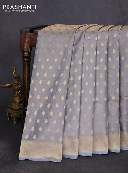 Banarasi tissue uppada silk saree grey with allover zari woven butta weaves and zari woven border