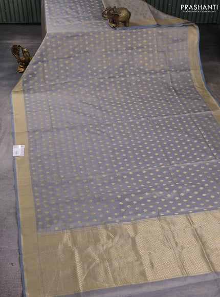 Banarasi tissue uppada silk saree grey with allover zari woven butta weaves and zari woven border
