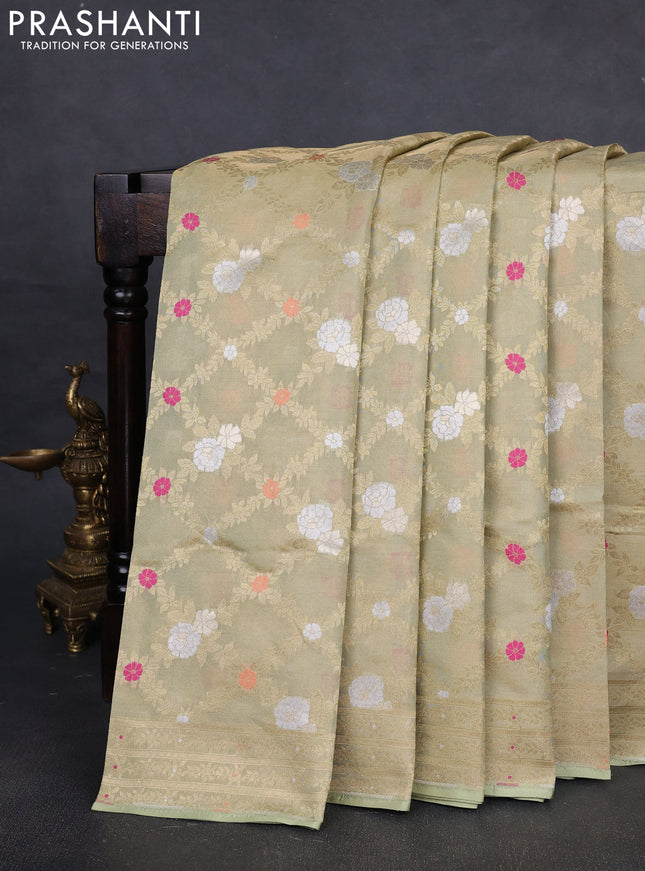Banarasi tissue uppada silk saree pista green with allover thread & zari floral weaves and zari woven border