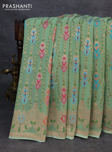 Banarasi semi georgette saree pista green with allover thread & zari weaves and woven border