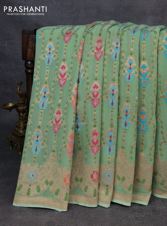 Banarasi semi georgette saree pista green with allover thread & zari weaves and woven border