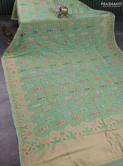 Banarasi semi georgette saree pista green with allover thread & zari weaves and woven border