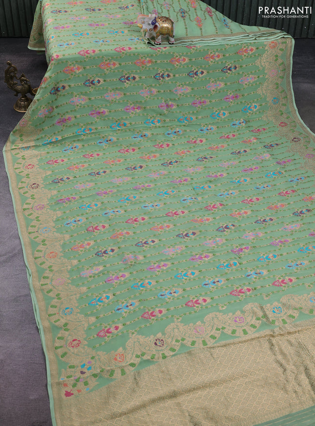 Banarasi semi georgette saree pista green with allover thread & zari weaves and woven border