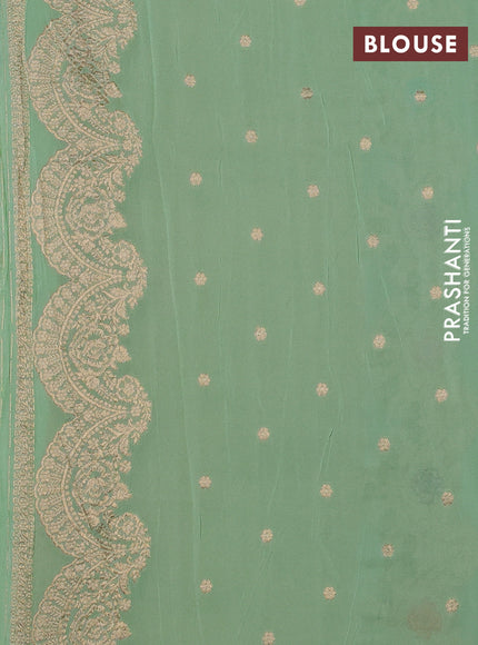 Banarasi semi georgette saree pista green with allover thread & zari weaves and woven border