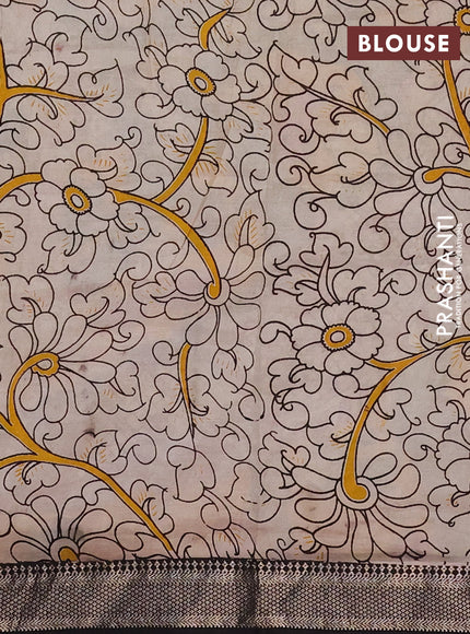 Kalamkari semi silk saree pastel green and black with allover prints and mangalgiri border