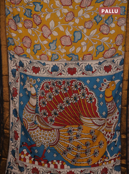 Kalamkari semi silk saree mustard yellow and black with allover prints and mangalgiri border