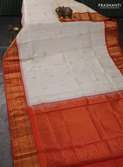 Kuppadam silk cotton saree off white and orange with allover vairaosi pattern & buttas and temple design zari woven border