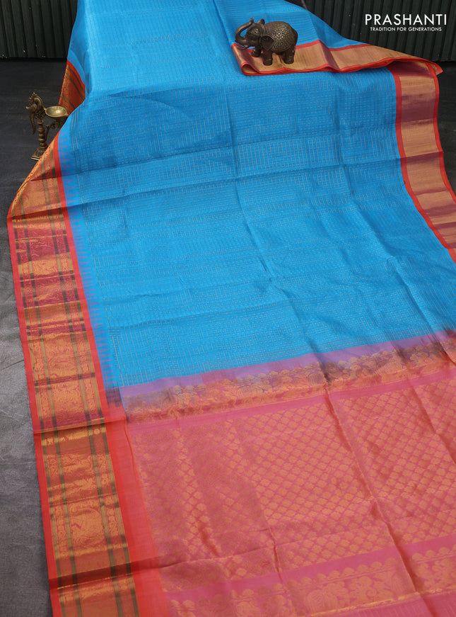 Kuppadam silk cotton saree cs blue and orange with allover laksha deepam pattern and temple design zari woven border