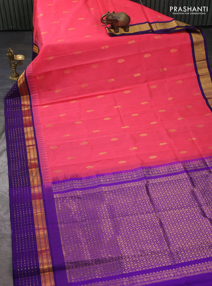 Kuppadam silk cotton saree peach pink and violet with zari woven buttas and temple design zari woven butta border