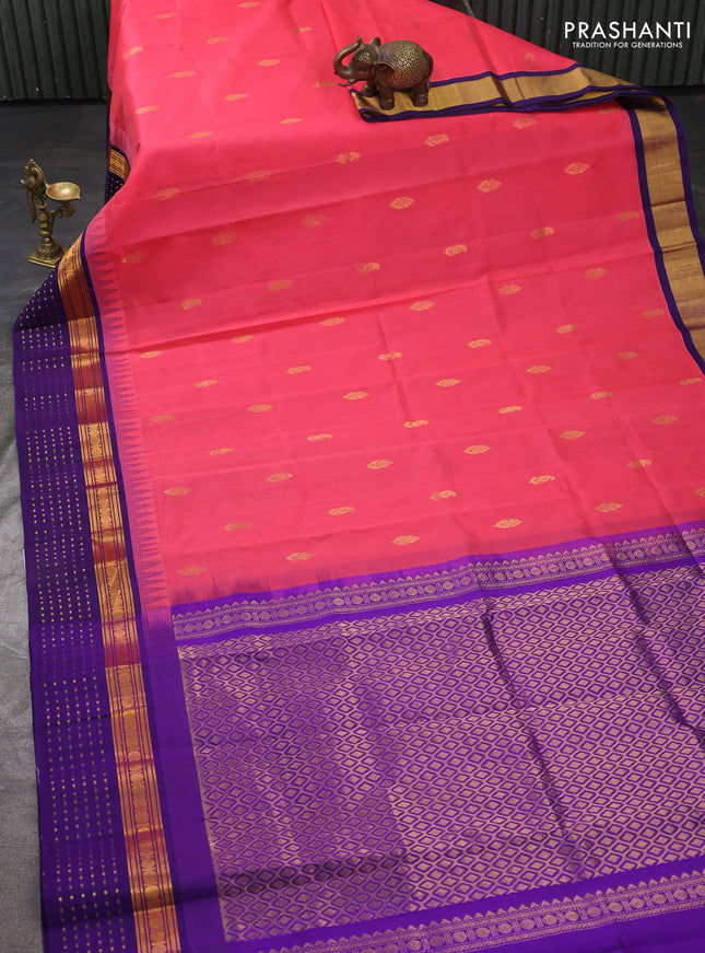 Kuppadam silk cotton saree peach pink and violet with zari woven buttas and temple design zari woven butta border