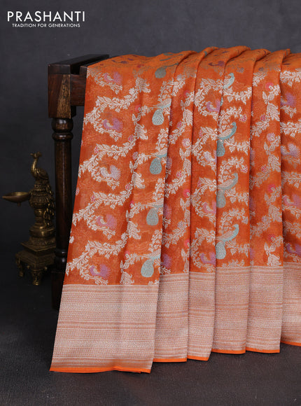 Art chiffon saree orange with allover thread & zari peacock weaves and zari woven border