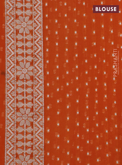 Art chiffon saree orange with allover thread & zari floral weaves and zari woven border