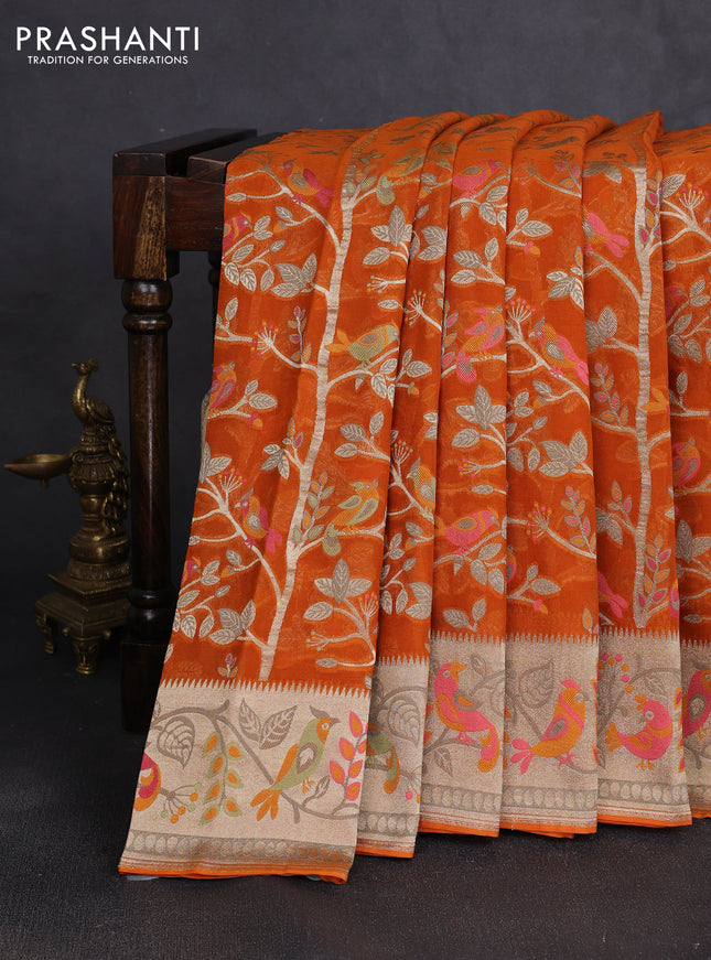 Art chiffon saree orange with allover birds weaves and zari woven border