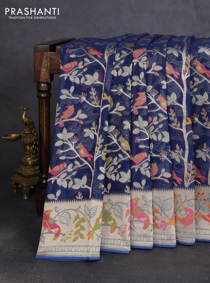 Art chiffon saree peacock blue with allover birds weaves and zari woven border