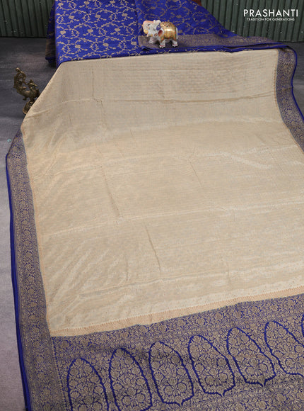 Banarasi crepe partly saree beige and blue with allover thread & zari woven buttas and woven border