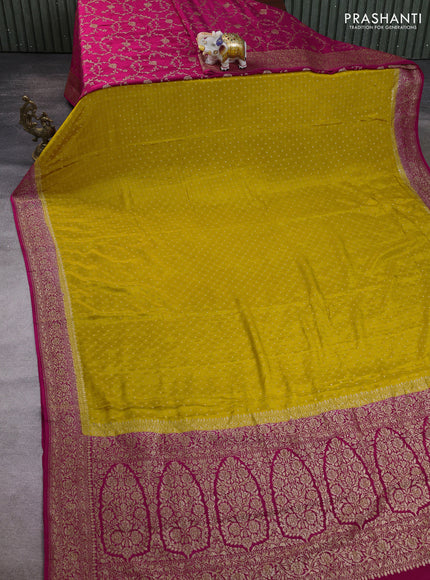 Banarasi crepe partly saree mustard yellow and pink with allover thread & zari woven buttas and woven border