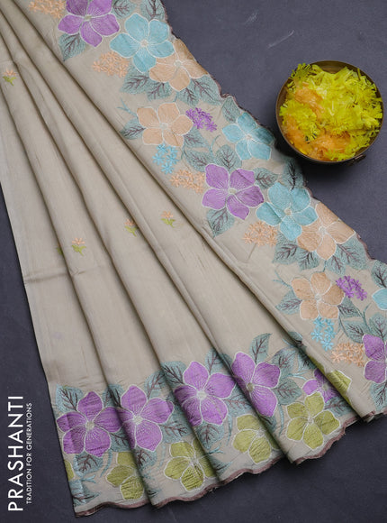 Semi raw silk saree beige with embroidery buttas and floral embroidery border