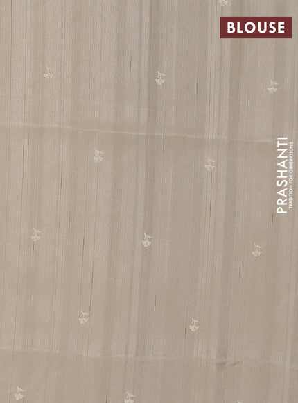 Semi raw silk saree beige with embroidery buttas and floral embroidery border