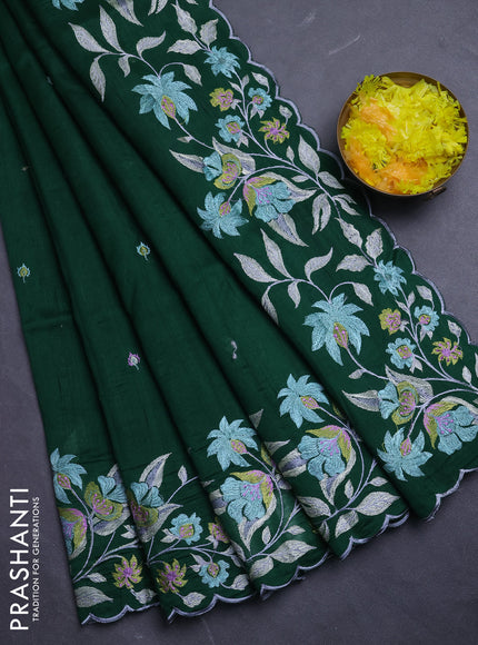 Semi raw silk saree bottle green with embroidery buttas and floral embroidery border