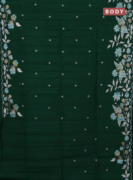 Semi raw silk saree bottle green with embroidery buttas and floral embroidery border