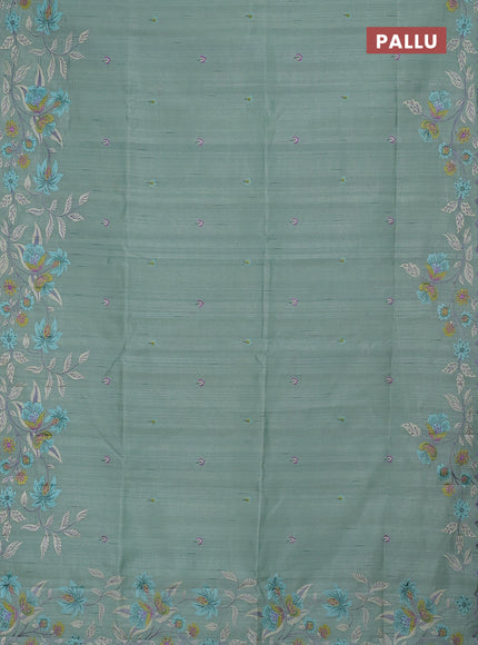 Semi raw silk saree pastel green with embroidery buttas and floral embroidery border