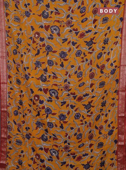 Kalamkari semi silk saree mango yellow and rust shade with allover prints and mangalgiri border