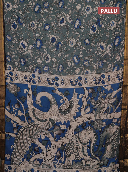 Kalamkari semi silk saree pastel green and black with allover prints and mangalgiri border