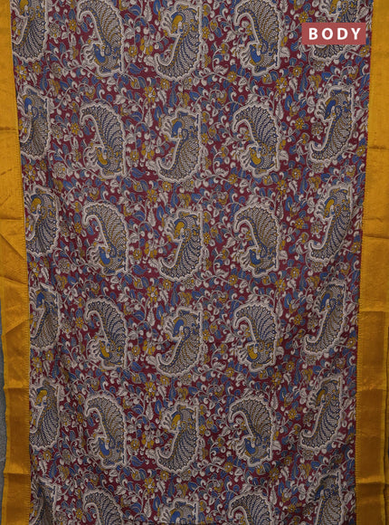 Kalamkari semi silk saree deep maroon and yellow with allover prints and mangalgiri border