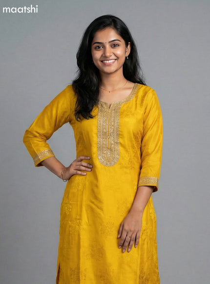 Mustard Yellow and Red Art Tussar Embroidery Work Straight Suit