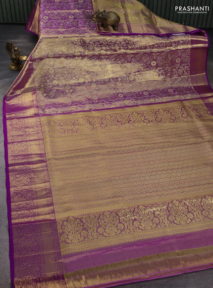 Pure kanchipuram tissue silk saree dual shade of purple with allover zari woven brocade weaves and rich zari woven border