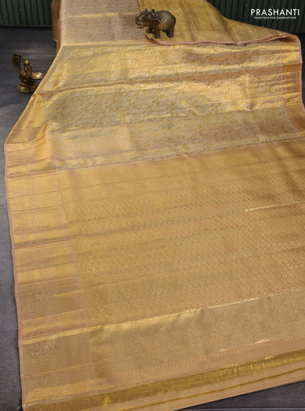 Pure kanchipuram tissue silk saree gold and sandal with alllover zari woven peacock brocade weaves and rich zari woven border