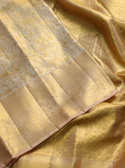 Pure kanchipuram tissue silk saree gold and sandal with alllover zari woven peacock brocade weaves and rich zari woven border