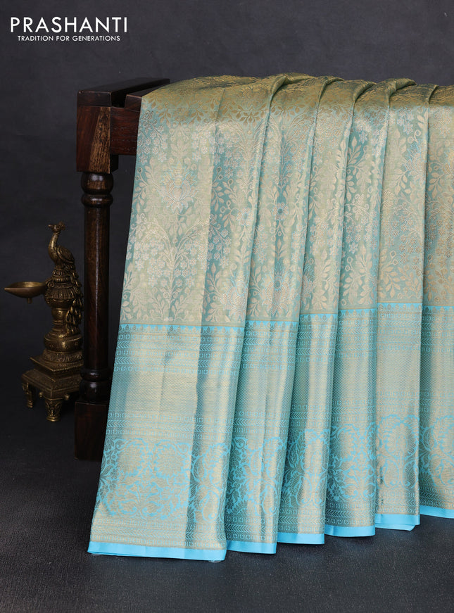 Pure kanchipuram tissue silk saree light blue with allover zari woven brocade weaves and rich zari woven border