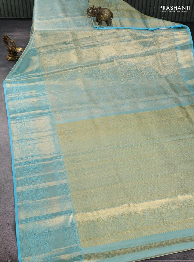 Pure kanchipuram tissue silk saree light blue with allover zari woven brocade weaves and rich zari woven border