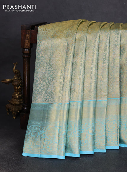 Pure kanchipuram tissue silk saree golden light blue with allover zari woven brocade weaves and rich zari woven border